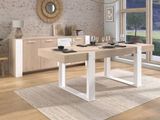a dining room with a table and chairs in it