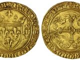 une pièce d'or ornée d'un blason