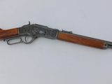 a gun with a wooden handle and a wooden barrel