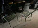 a green chair and a table in a room