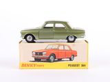 a green toy car sitting on top of a box