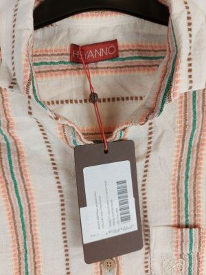 a close up of a shirt with a tag on it