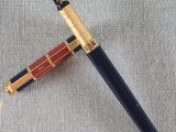an image of a pen with a red and blue stripe on it