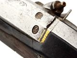 a close up of a gun on a white background