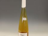 a bottle of wine that is sitting on a table