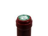 a bottle of wine that is sitting on a table
