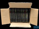 a cardboard box with a bunch of discs inside of it