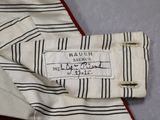 a close up of a shirt with a label on it