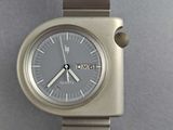 an image of a close up of a wrist watch on a table
