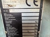 a close up of a sign on the side of a machine