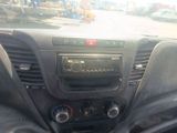 a car dashboard with a radio and other electronics in it