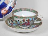 a cup and saucer with a saucer on it