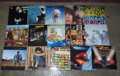 the album covers of the albums are arranged on the floor