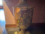 a vase that is sitting on a table in a room