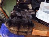 many bags and purses that are on a table
