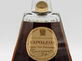 an image of a bottle of liquor on a white surface