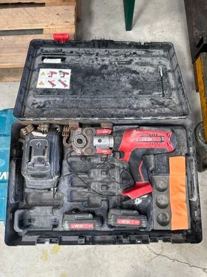 a tool box with tools in it on the floor