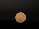 an image of a gold coin on a black background