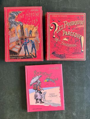 trois livres pour enfants sont posés sur une table les uns à côté des autres