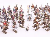 a lot of figurines of people riding on horses