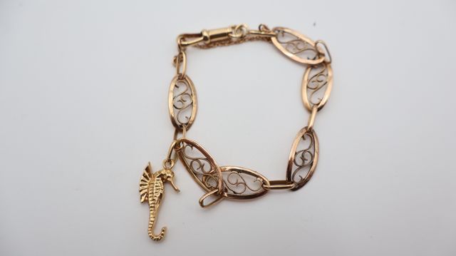 Bracelet en or jaune 18 carats 750 millièmes maille filigrane, hi...