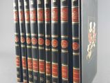 a set of six books with red and black covers