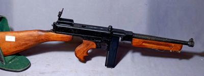 a toy gun that is sitting on a table