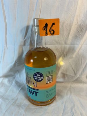 a bottle of alcohol that is sitting on a table