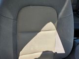 the back seat of a car with the sun shining on it