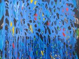 an abstract painting of blue and yellow paint on a black background