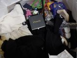 a bag full of clothes and other items in it