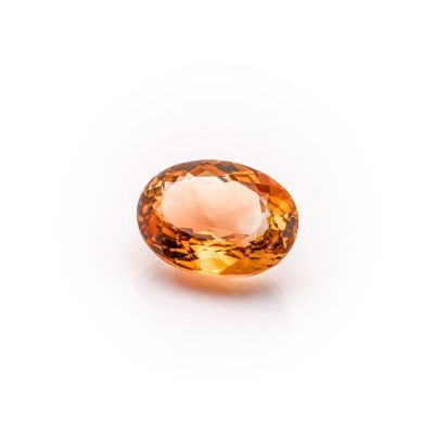 an orange sapphire gems on a white background