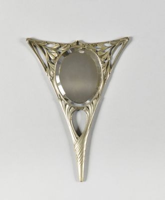 Miroir ovale en métal argenté par Paul Follot