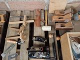 a lot of woodworking tools sitting on a pallet