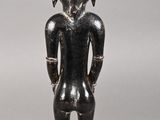 pair of black and silver figurines of a man and a woman