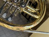 a brass instrument that is sitting on a table