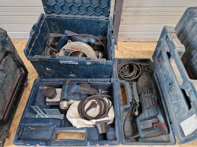 a tool box with tools in it sitting on the floor