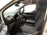 the interior of a car with the door open and the driver ' s seat down