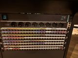 an image of a rack of electronic equipment in a room
