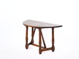 an old wooden table with a marble top on a white background