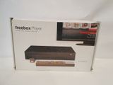 the box for the freebox player is open and ready to be used