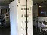 an image of a large white refrigerator in a room