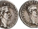 a silver coin with an image of a man on it