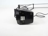 a black object that is on a white surface