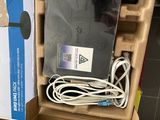 a box that has a laptop in it on top of a table