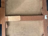 an old picture of a box with a piece of wood sticking out of it