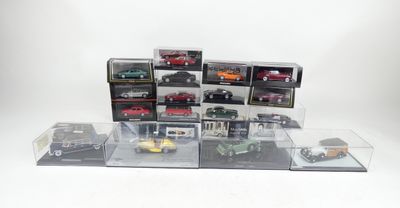 a lot of toy cars that are in a display case