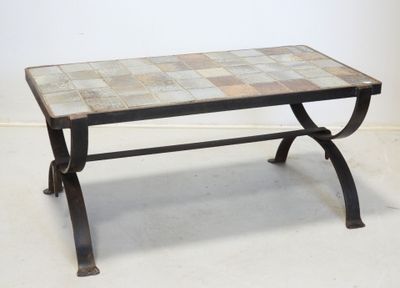 a small table with a tile top on a white floor
