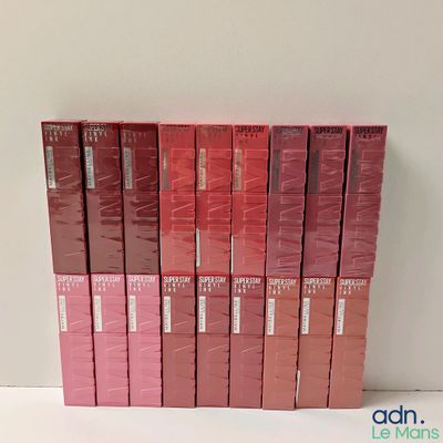 the spines of the books are lined up on a shelf