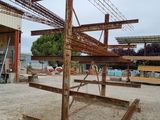 a large metal structure that is in the middle of a construction site